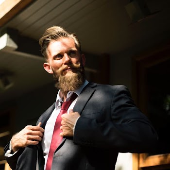 man in black suit jacket