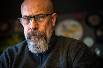 Man in Black Zip-up Jacket