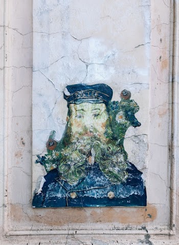 Man in Blue Coat Painting