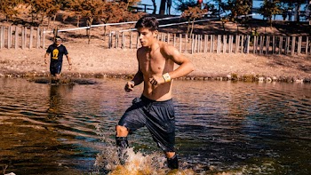 Man in Blue Shorts