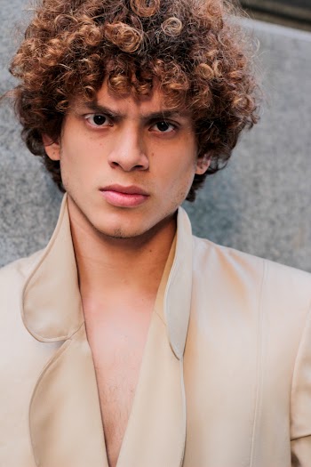 Man in Brown Collared Top on Focus Photography