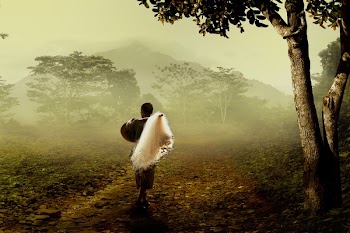 Man in Brown Robe Carrying White Fishing Net