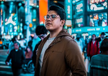 Man In Brown Zip-up Windbreaker