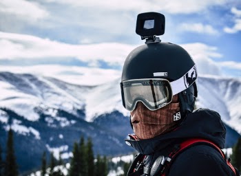 Man in Goggles and Helmet With Action Camera
