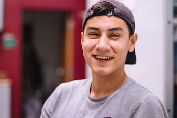 Man in Gray Crew-neck Top Smiling