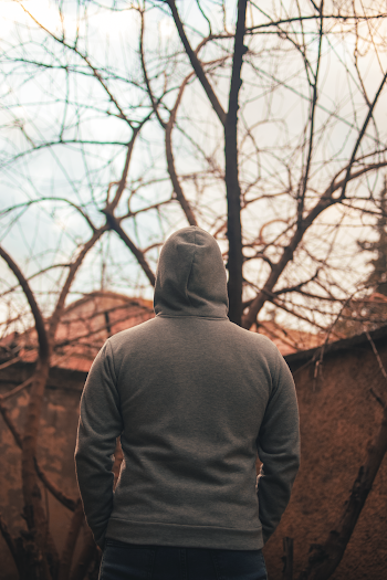 Man in Gray Hoodie Standing