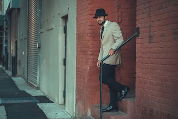 Man in Gray Suit Jacket
