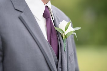 Man in Gray Suit Jacket and Calla Lily Boutonniere