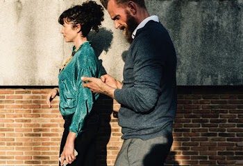 man in gray sweater
