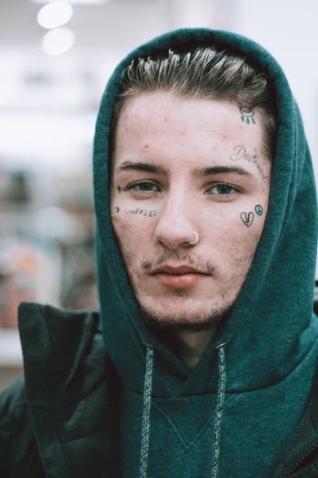 man in green pullover hoodie