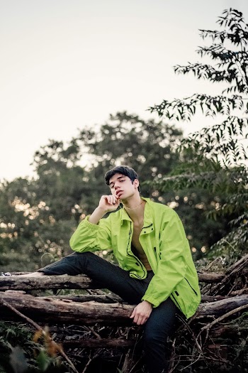 Man in Green Zip-up Jacket