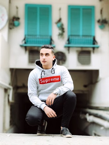 Man In Grey Supreme Hoodie 