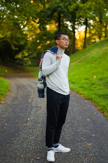 Man in Grey Turtleneck Long-sleeved Shirt and Black Pants Standing on Pathway