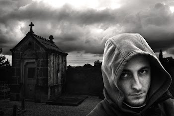 Man in Hoodie Near Church