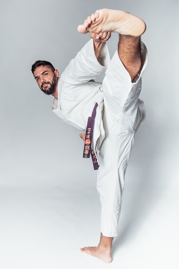 Man In Kicking Position