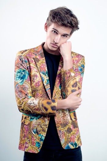Man in Multicolored Suit Jacket