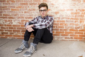 Man In Plaid Dress Shirt Sitting
