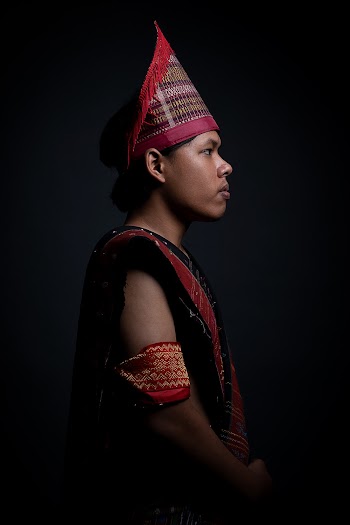 Man in Red and Black Traditional Apparels