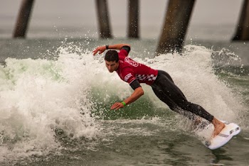 Man in Red and White T-shirt Surfing