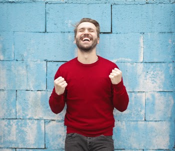 Man in Red Crew-neck Sweatshirt Photography