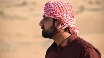 Man in Red Turban Tilt Shift Lens Photography