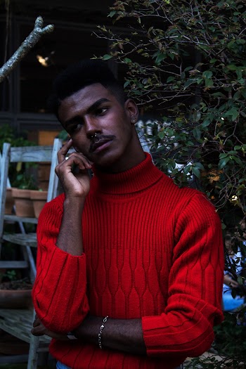Man in Red Turtleneck Sweatshirt