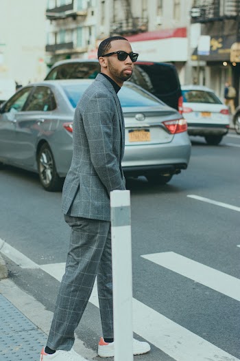 Man In Sunglasses And Grey Suit 