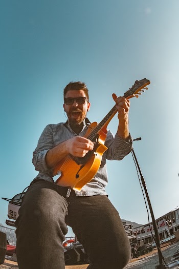 Man in Sunglasses Playing Jazz Guitar