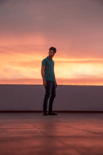Man in Teal Polo Shirt