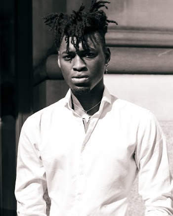 Man in White Button-up Collared Top