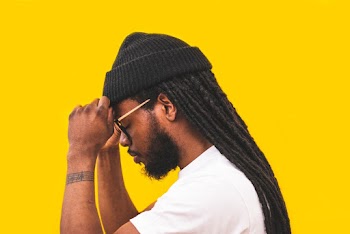 Man in White Crew Neck T-shirt and Black Beanie Hat