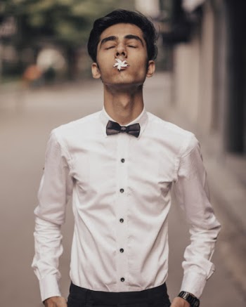 Man in White Dress Shirt Wearing Black Bowtie