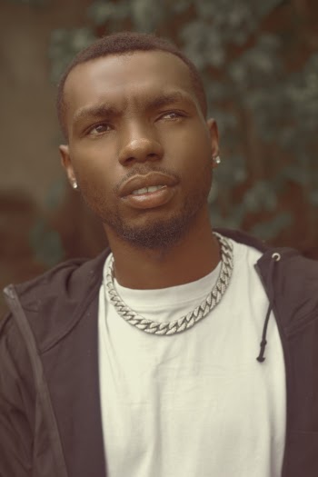 Man In White Shirt And Black Jacket