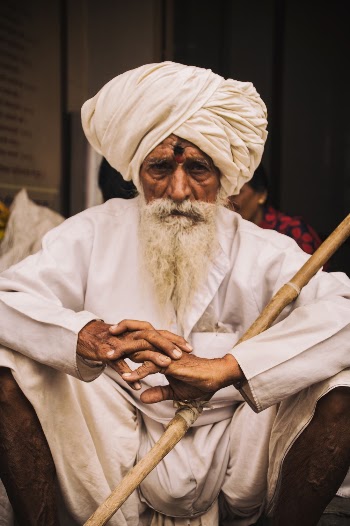 Man In White Thawb And Headscarf