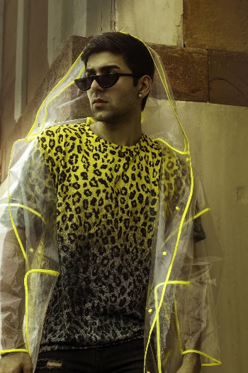 Man In Yellow And Black Leopard Printed Shirt