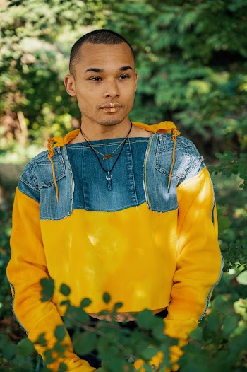 Man in Yellow and Blue Sweater