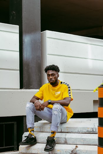 Man in Yellow Shirt