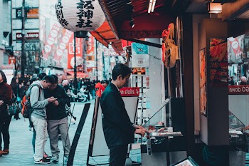 Man Infront of the Establishment