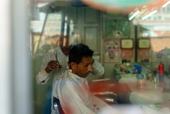 Man Inside Barber Shop