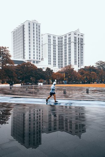 man jogging on park