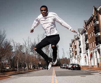 Man Jumping On Road