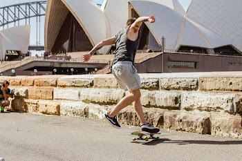 Man Jumping on Skateboard