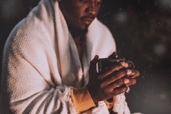 Man keeping warm with hot | Free Photo - rawpixel