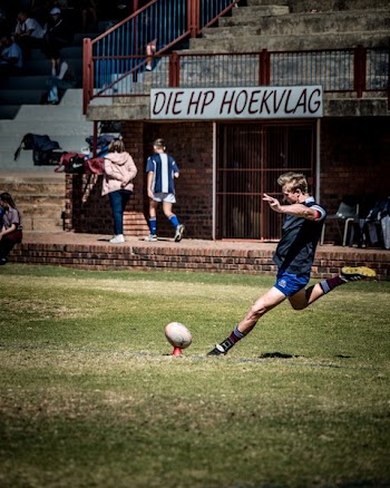Man Kicking Ball