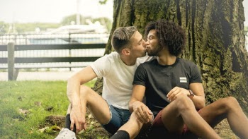 Man Kissing Other Man