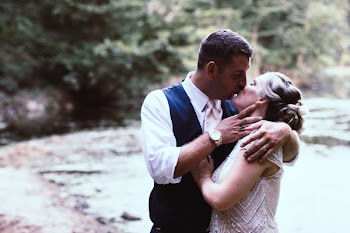 Man Kissing Woman