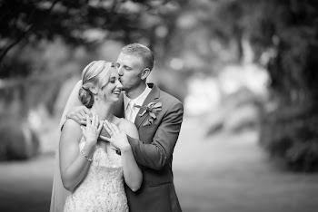 Man Kissing Woman