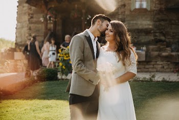 Man Kissing Woman