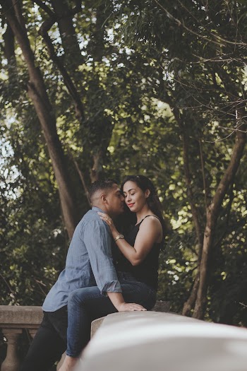 Man Kissing Woman