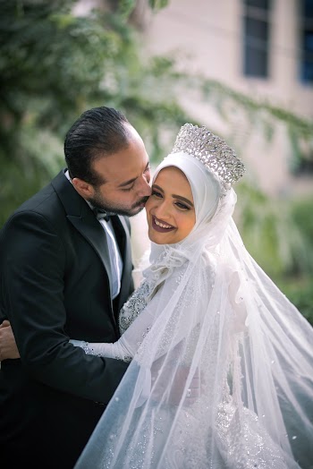 Man Kissing Woman's Cheek
